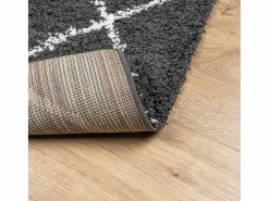 Alfombra moderna de pelo largo en color y crema de 140 x 200 cm Negro Clearance