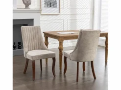Conjunto de 2 sillas con patas de madera curvadas y respaldo alto.^Hauss Spole Sale